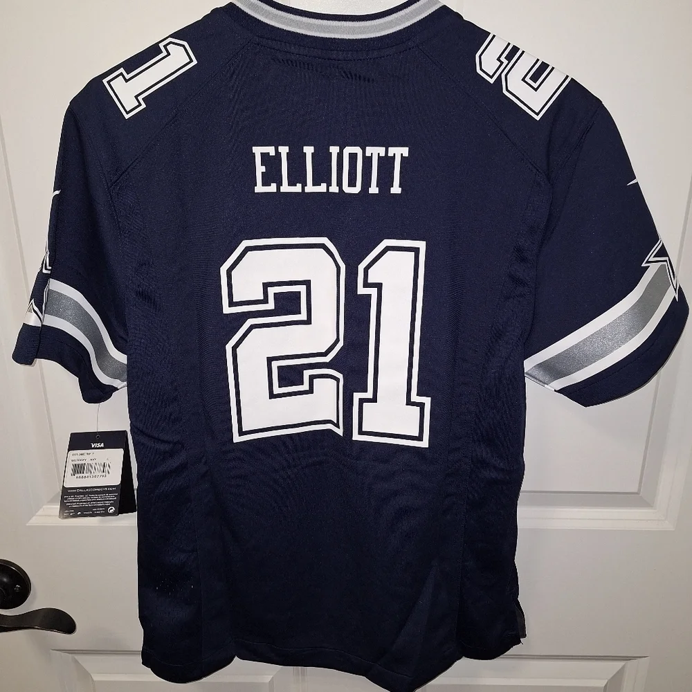 A Nike official NFL Dallas Cowboys Youth #21 Elliot jersey in a size large. NWT
